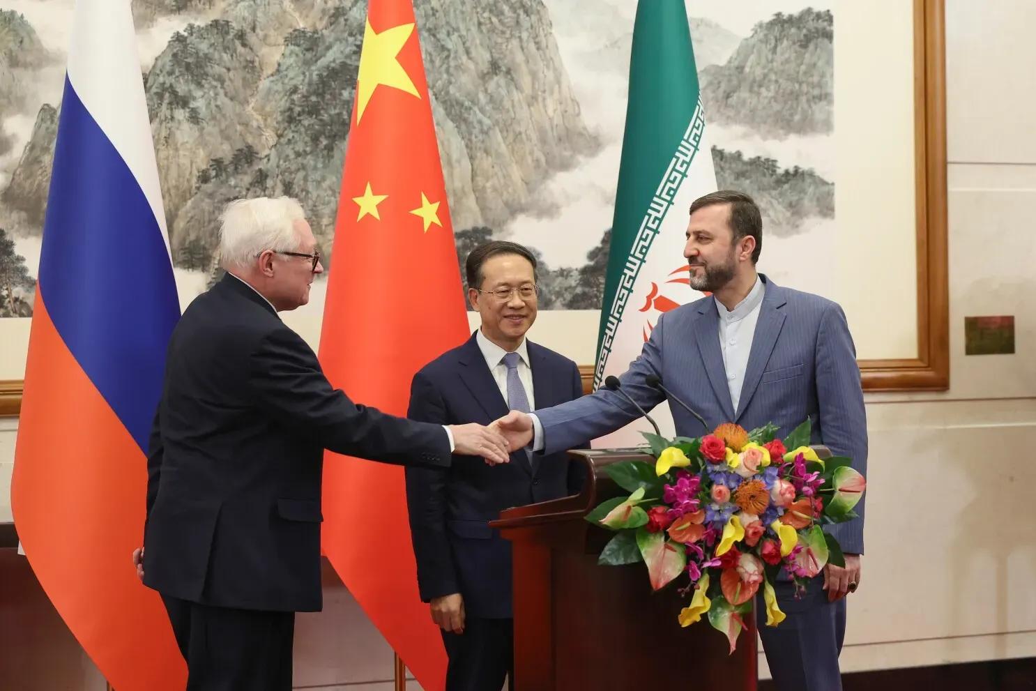 Iran hosts Russia and China in Tehran to coordinate Iran's nuclear strategy ahead of the meeting with European nuclear powers.